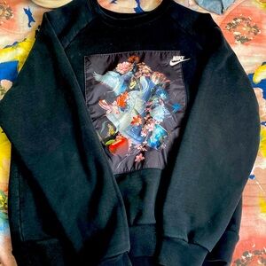 Black Nike crewneck, with exotic design